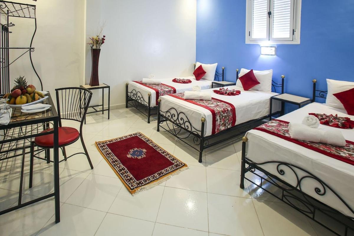 Hotel La Pomme Zaida Bagian luar foto