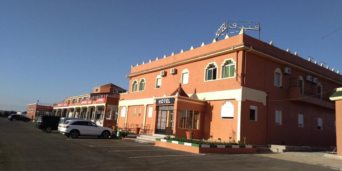 Hotel La Pomme Zaida Bagian luar foto