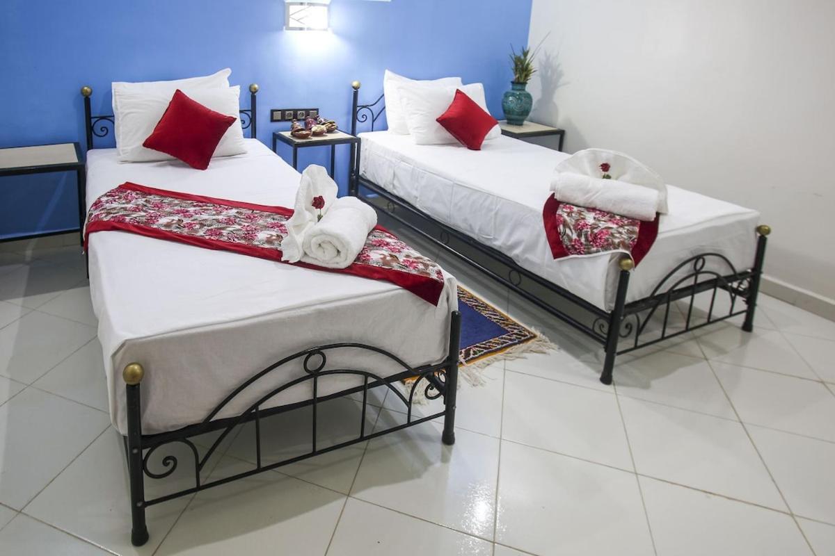 Hotel La Pomme Zaida Bagian luar foto