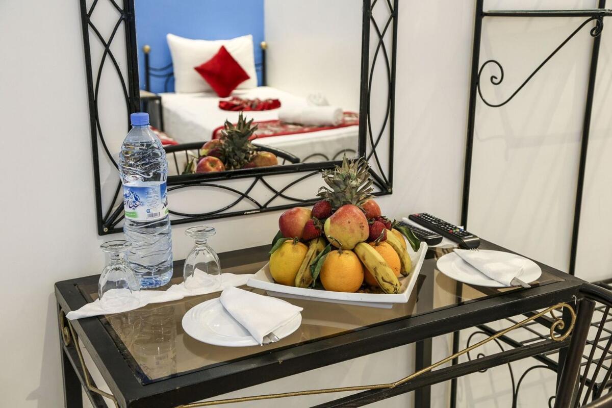 Hotel La Pomme Zaida Bagian luar foto